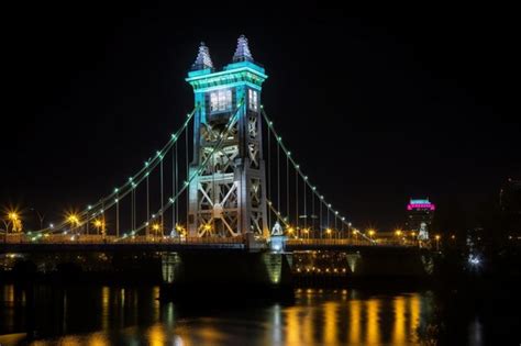 Premium Photo | Illuminated sacramento tower bridge at night