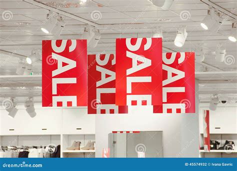 Sale Signs In A Clothing Store Stock Photo - Image: 45574932