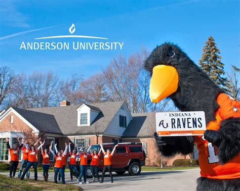 a large bird mascot holding a sign in front of a group of people ...