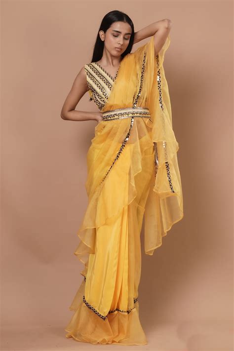 Buy Yellow Organza Ruffle Saree With Blouse For Women by Rishi ...