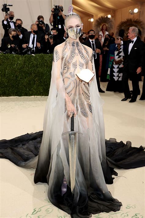 Grimes Brings a Sword to the 2021 Met Gala Red Carpet