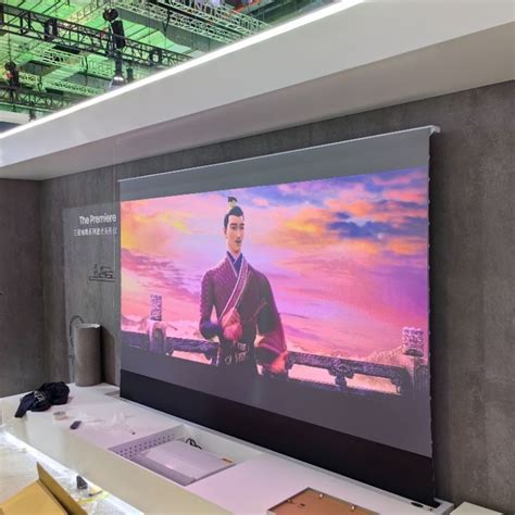 a large projection screen in the middle of a room