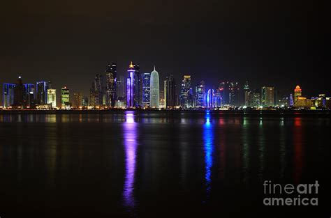 Skyline of Doha, Qatar at night Photograph by IPics Photography - Fine Art America