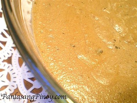 a close up of a bowl of food on a doily