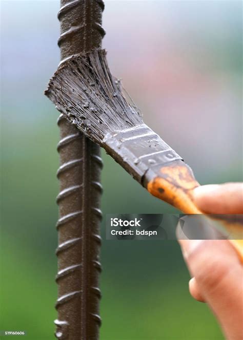 Painting An Iron Rod Stock Photo - Download Image Now - Activity, Close ...