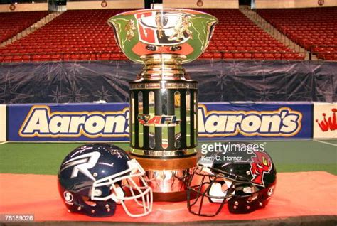 The AFL Championship trophy and helmets of the Chicago Rush and the ...