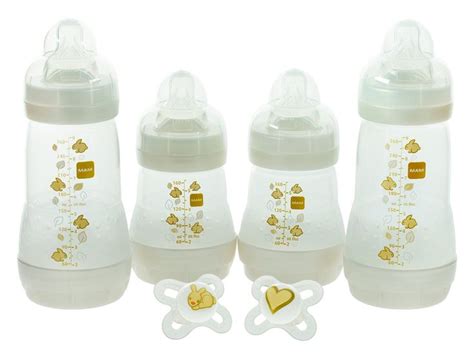 Silicone Imported 4 anit colic bottles and 2 MAM silicone pacifiers ...