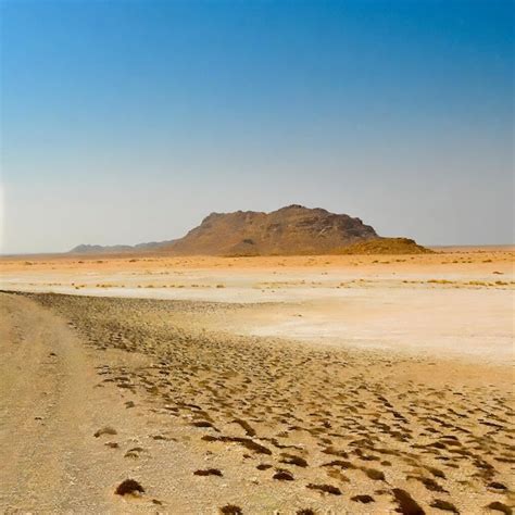 Premium AI Image | Desert Mirage A Mirage of Beauty in the Arid Wilderness