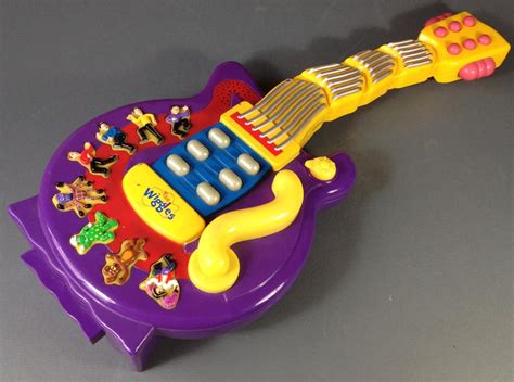 The Wiggles purple wiggly musical guitar works battery-operated GWO works | eBay