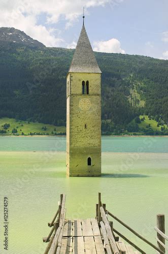 Italy, sunken church tower in Reschen Lake - Lago di Resia - in South Tyrol Stock Photo | Adobe ...