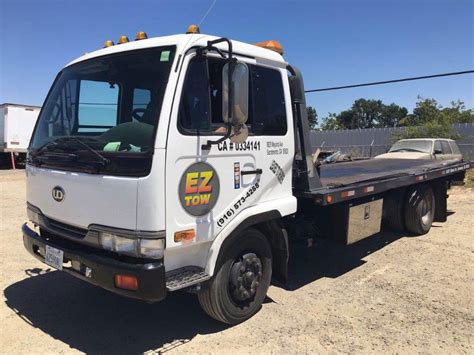 Flatbed Towing or Dolly Towing? That is the Question. - Towing service