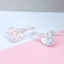 hammered sterling silver heart drop earrings by penelopetom | notonthehighstreet.com