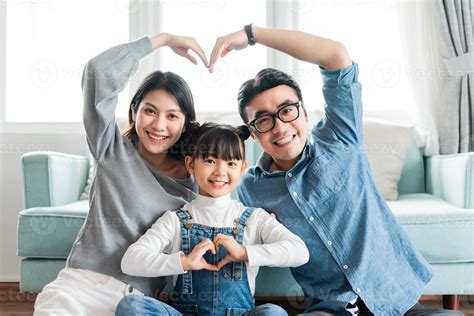 small asian family portrait at home 5732133 Stock Photo at Vecteezy