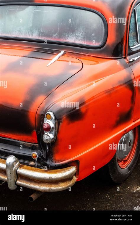 Rear view of a 1950's Standard Vanguard car painted with red oxide ...