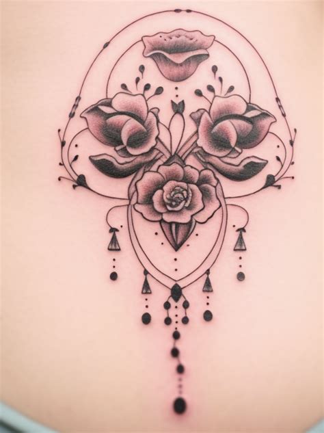 Womb Tattoo - The Bridge Tattoo Designs