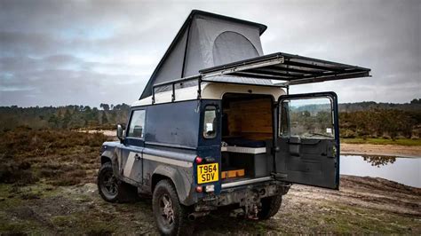 Classic Land Rover Defender Raises Its Roof As Compact Camper