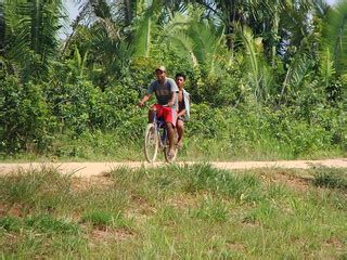 Cyclists in the Amazon rainforest | Ben Sutherland | Flickr