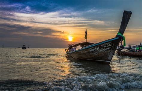 Photo of Brown Boat at Sea during Golden Hour · Free Stock Photo