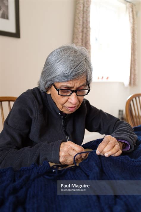 Buy a photo - Old woman knitting - Paul Maguire