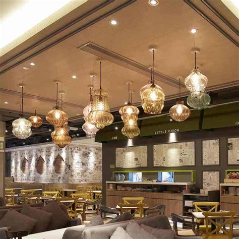 modern pendant lights in a restaurant - TCP Lighting