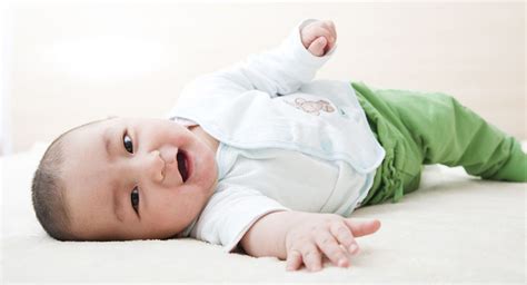 When do babies roll over? | BabyCenter