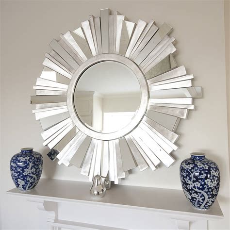 striking silver contemporary mirror by decorative mirrors online | notonthehighstreet.com