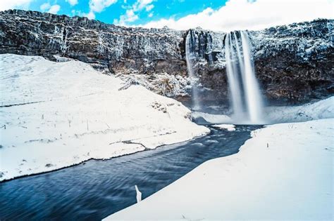 Premium Photo | Iceland seljalandsfoss waterfall winter in iceland seljalandsfoss waterfall in ...