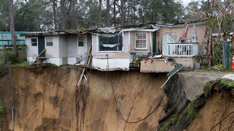 Giant sinkhole opens at Florida mobile home park, threatens to swallow home