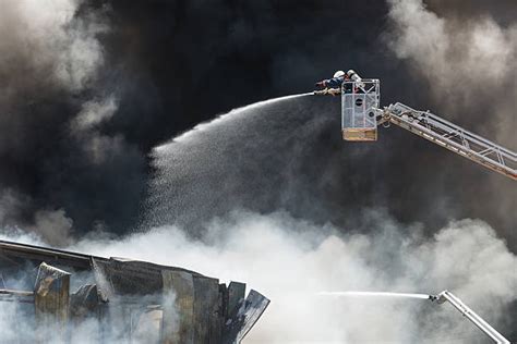 Fireman Lift Stock Photos, Pictures & Royalty-Free Images - iStock