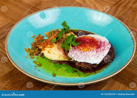 Roasted beefsteak with egg stock image. Image of cutlet - 122338169