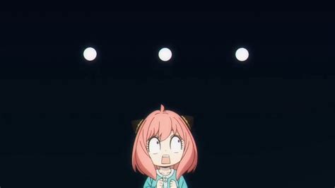 a girl with pink hair standing in front of three spotlights on a dark background