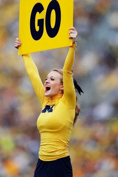 Michigan | Cheerleading, Michigan wolverines football, Michigan football