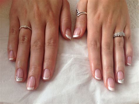 💍 Wedding nails for bride. French manicure using rhinestones and ...
