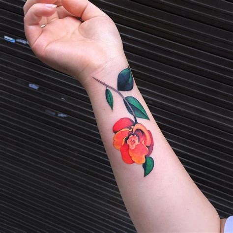 Orange and red flower tattoo | Flower tattoos, Flower tattoo, Red flower tattoos