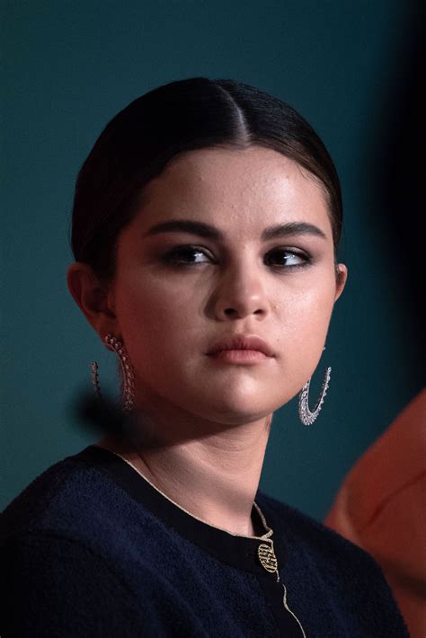 May 15: Selena attending a press conference during the 72nd Annual ...