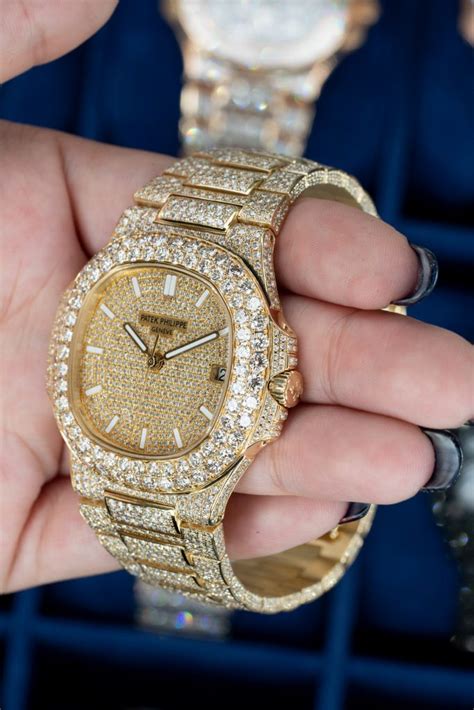 Patek Nautilus: Rose Gold and Buss Down - Raymond Lee Jewelers