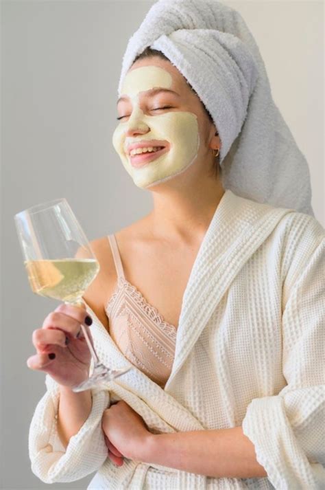 Woman with face mask holding glass of wine #paid, , #ad, #ad, #mask, # ...