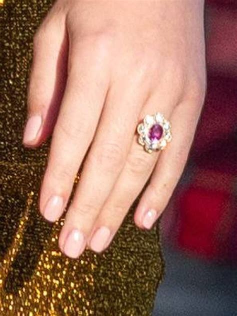 Katy Perry turns heads as she shows off HUGE ring and tight dress amid ...