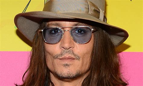 Johnny Depp reveals the real reason behind his famous tinted glasses ...