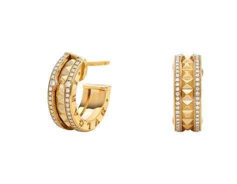 B.zero1 Rock 18 kt yellow gold earrings with studded spiral and pavé diamonds on the edges ...
