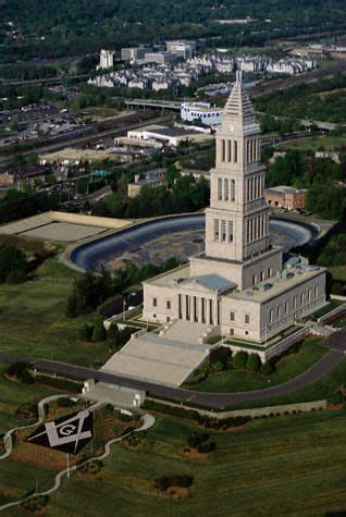 an aerial view of a large white building