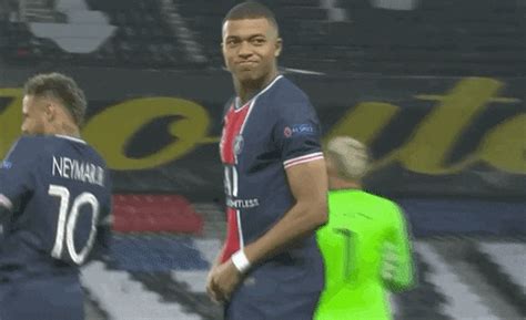 Footballer Kylian Mbappe Nodding Awkward Smile GIF | GIFDB.com