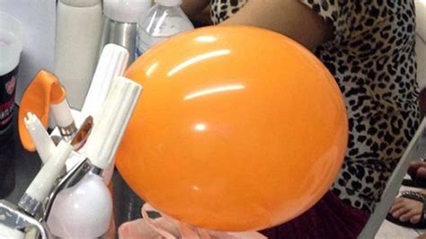 Thai police crack down on 'laughing gas' balloons - World - CBC News