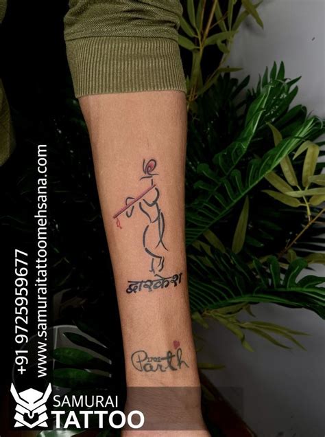 a person with a tattoo on their arm holding a baseball bat and wearing ...