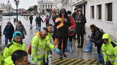 After Venice Floods, Volunteers Wade In To Help Salvage What They Can : NPR