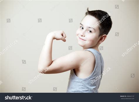 Cute Funny Kid Flexing Biceps Stock Photo 408665137 : Shutterstock