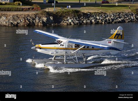 DeHavilland DHC-3 Turbine Single Otter floatplane taxiing in harbour at Victoria, Vancouver ...