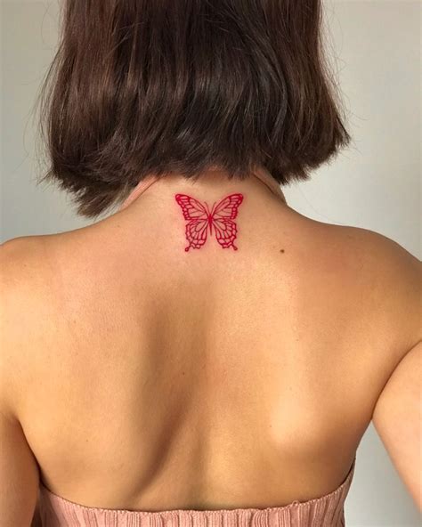 Red butterfly tattoo by @lorettacolumba on insta | Discreet tattoos, Red ink tattoos, Tattoos ...