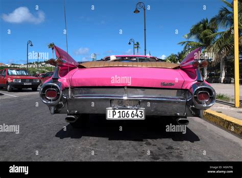 Havana, Cuba. 1959 Cadillac Eldorado, pink classic vintage car, old taxi, cab in Cuban city ...