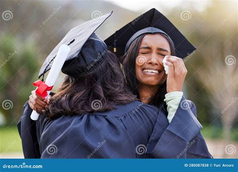 Education, Graduation and Crying with Friends Hugging in Support or Celebration at a University ...